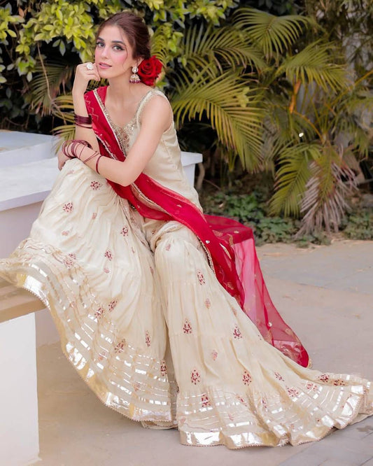 Traditional Ivory Sharara Suit with Embroidered Red Dupatta